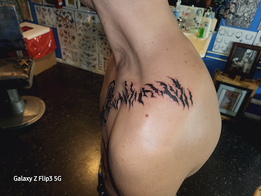 Explore japanese lettering tattoo ideas, creative tattoo ideas in Englewood, available at The Original Big Daddy Tattoo & Body Piercing est.1997 est.1997