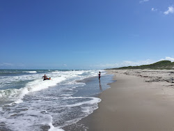 Foto van Hangar's beach met recht en lang