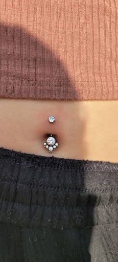 Explore kingfisher tattoo ideas, creative tattoo ideas in Toledo, available at Artistik Tat2 and Body Piercing