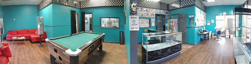 Tattoo Shop «Sugar Skulls Tattoo Shop», reviews and photos, 1935 S College St, Auburn, AL 36832, USA