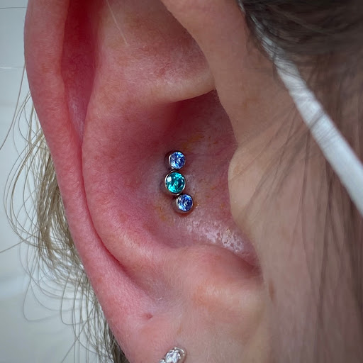 Explore spider-man tattoo ideas, creative tattoo ideas in Clawson, available at Green Light Body Piercing