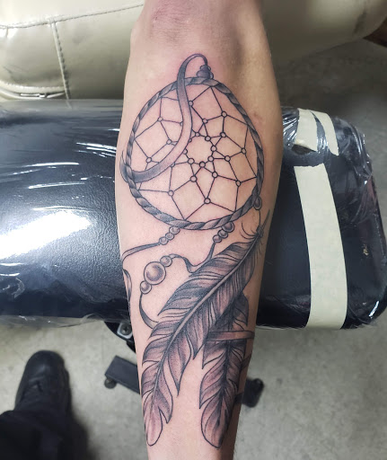 Explore heart tattoo ideas with names, creative tattoo ideas in Sioux Falls, available at Outlaw Tattoos