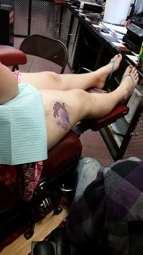 Explore neck tattoos ideas male, creative tattoo ideas in Longview, available at Fugis Tattoo Shop