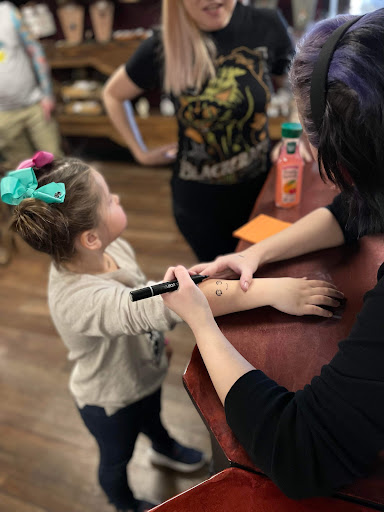 Explore name tattoo ideas arm, creative tattoo ideas in Clarksville, available at Dark Raine Tattoo