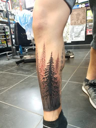 Explore dog paw tattoo ideas, creative tattoo ideas in Albuquerque, available at Por Vida Tattoo