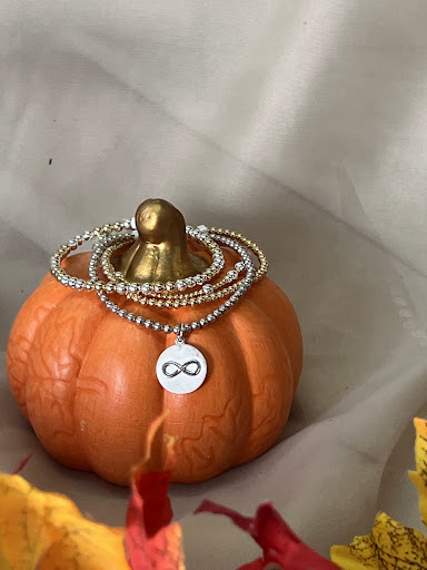 Explore liberty bell tattoo ideas, creative tattoo ideas in Newton, available at Danas Fine Jewelry, Inc.