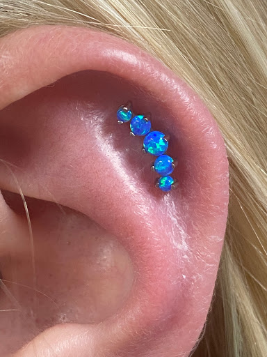 Explore meaningful tattoo ideas for females, creative tattoo ideas in Huntington, available at Golden Dagger Tattoos and Piercings