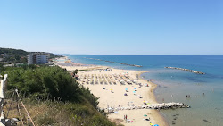 Lido Riccio Beach'in fotoğrafı düz ve uzun ile birlikte