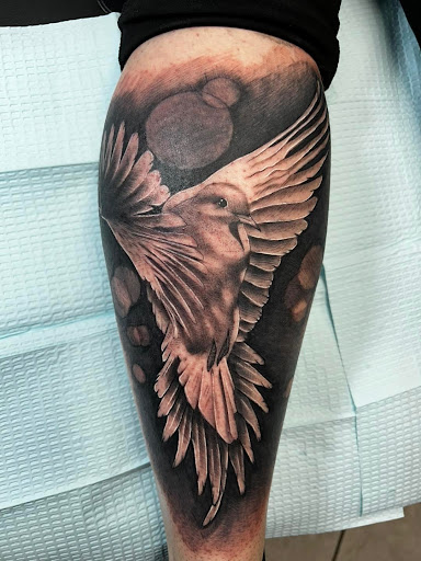 Explore new dad tattoo ideas, creative tattoo ideas in Daytona Beach, available at Studio 21 Tattoo & Piercings Daytona Beach
