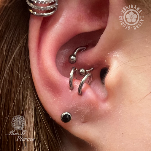 Explore book lovers tattoo ideas, creative tattoo ideas in Laredo, available at Horikawa Tattoo & Piercing Studios