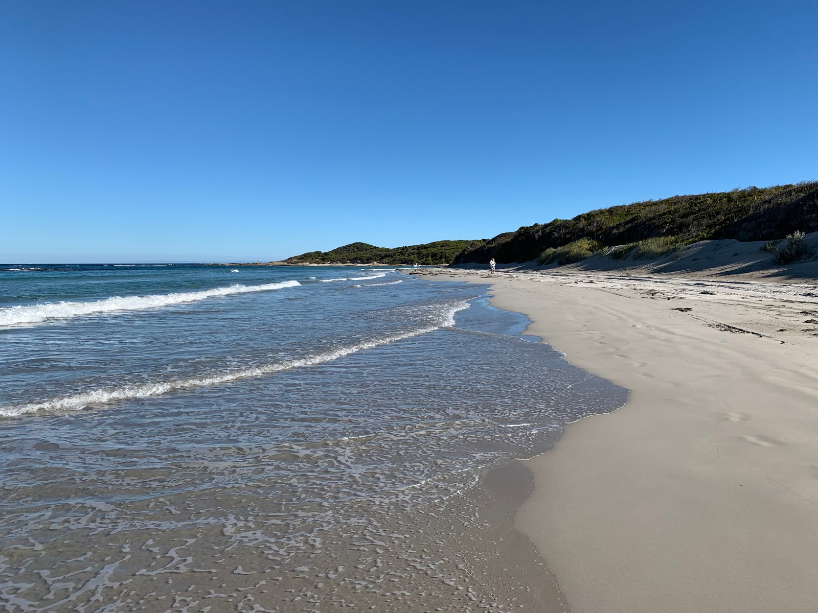 Fotografija Parry Beach z svetel pesek površino