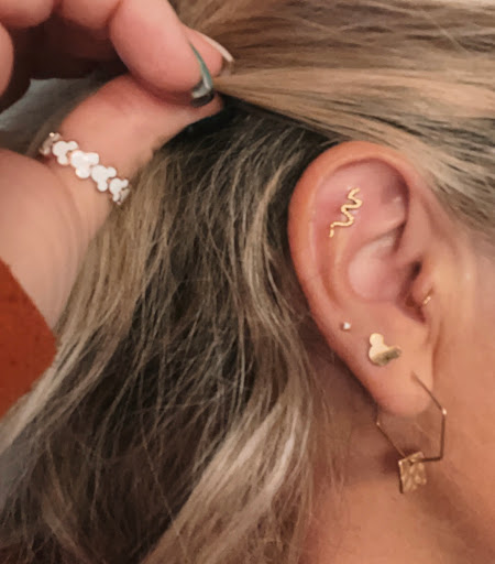 Explore hood tattoo ideas, creative tattoo ideas in Tooele, available at Elevn11 Piercings
