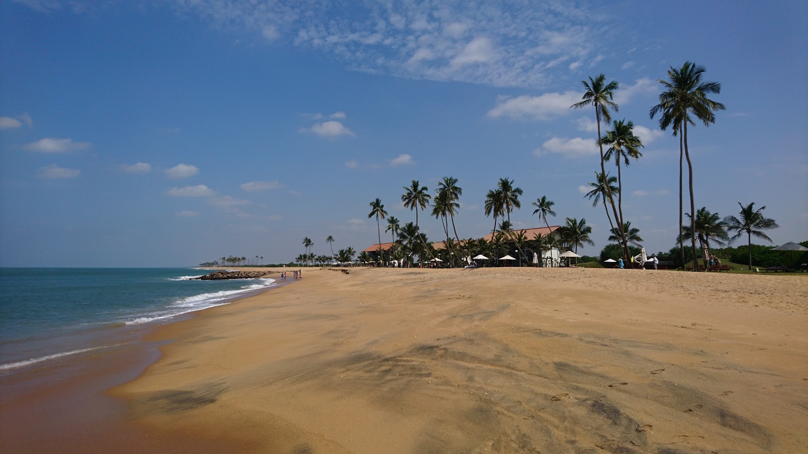 Karukapone Beach的照片 带有长直海岸
