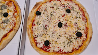 Plats et boissons du Pizzas à emporter DIVINO PIZZA 11 à Montredon-des-Corbières - n°1