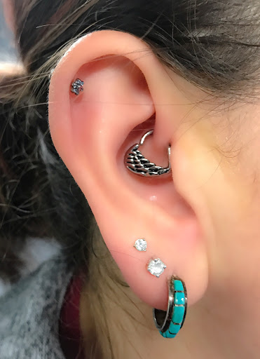 Explore simple space tattoo ideas, creative tattoo ideas in Springfield, available at Body Piercing By Qui Qui