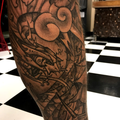 Explore tattoo ideas for upper arm, creative tattoo ideas in Augusta, available at Mr. Tattoo