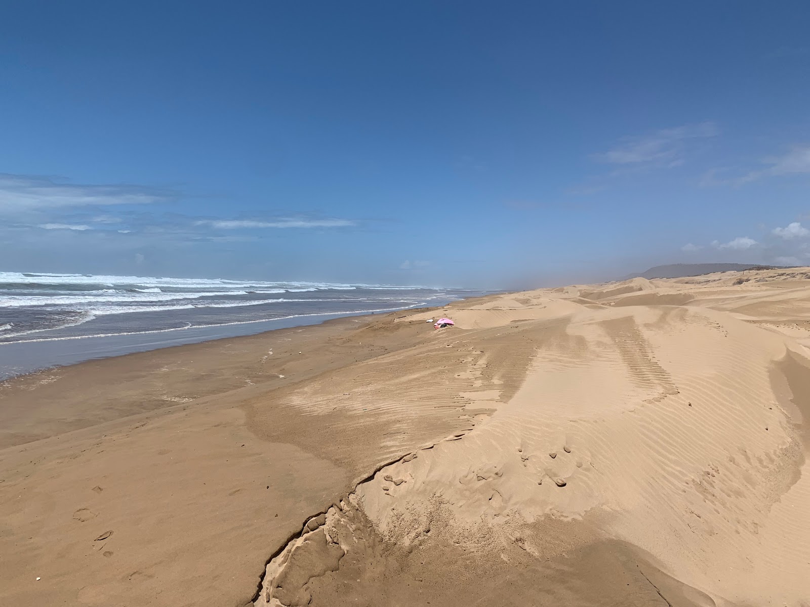 Foto de Plage con arena fina beige superficie