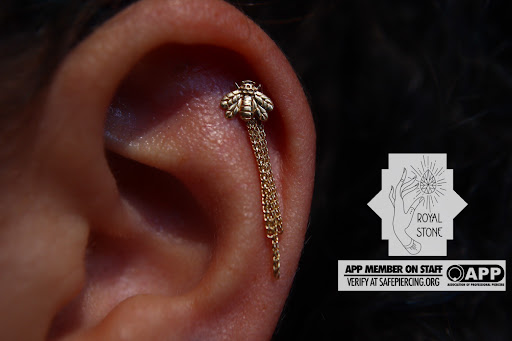 Explore tattoo scroll ideas, creative tattoo ideas in Mobile, available at Royal Stone Piercing