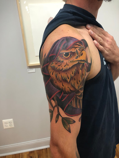 Explore cover up ideas for wrist tattoo, creative tattoo ideas in Kansas City, available at Golden Stag Tattoo and Gallery