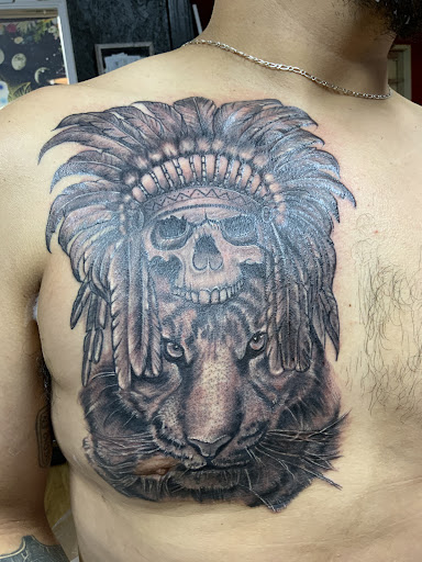 Explore mens wedding ring tattoo ideas, creative tattoo ideas in Arlington, available at Tat2z4Life LLC Tattoos and Body Piercings BY ALMA