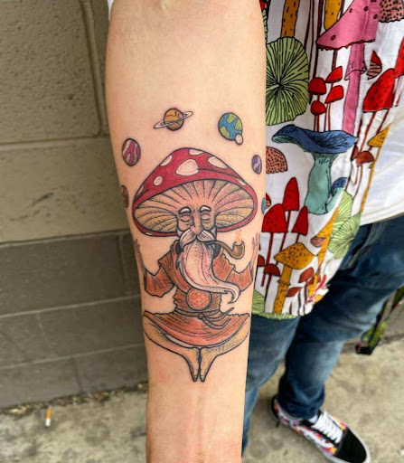 Explore rose thigh tattoo ideas, creative tattoo ideas in Spokane, available at Feel Good Ink