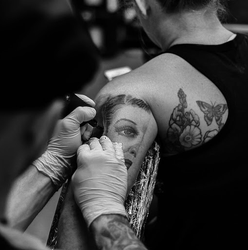 Explore tattoo ideas on tricep, creative tattoo ideas in Minneapolis, available at The Ink Tailor LLC