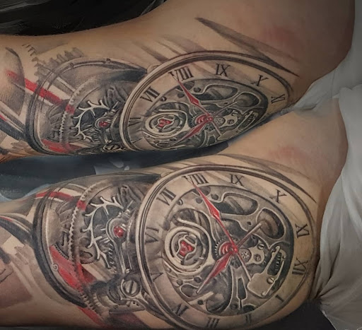 Explore wedding ring tattoo ideas for him, creative tattoo ideas in Ambler, available at Tattoo GalaxyAmbler Piercing & Custom Tattoos