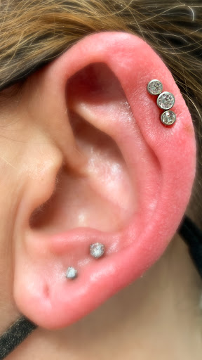 Explore cover up tattoo ideas for upper arm, creative tattoo ideas in Sarasota, available at Z-Edge Tattoo and Body Piercing North Shop