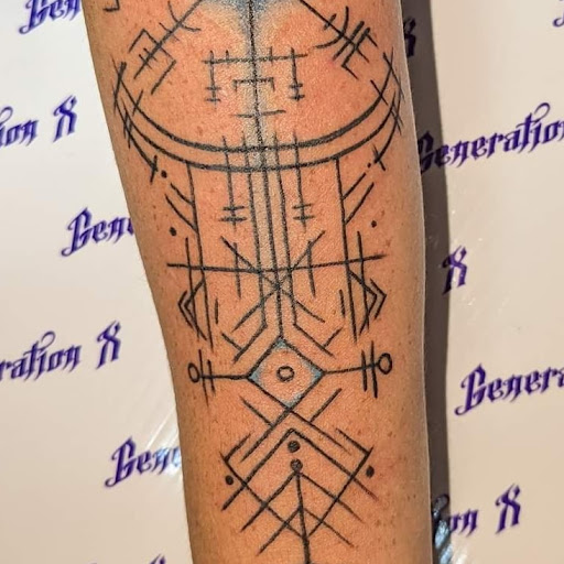 Explore mirrored tattoo ideas, creative tattoo ideas in Nevada, available at Generation X Tattoos and Piercings