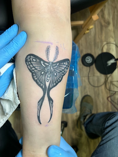 Explore ideas for hand tattoos, creative tattoo ideas in Gautier, available at Voodoo Tattoo