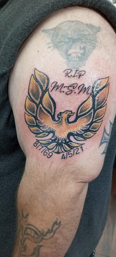 Find simple cat tattoo ideas for your next unique tattoo in Cedar Springs at Americas Renegade Tattoo Society