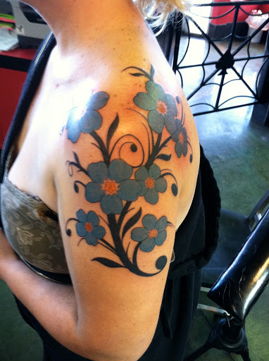 Find top of head tattoo ideas for your next unique tattoo in Reno at Aces Tattoo