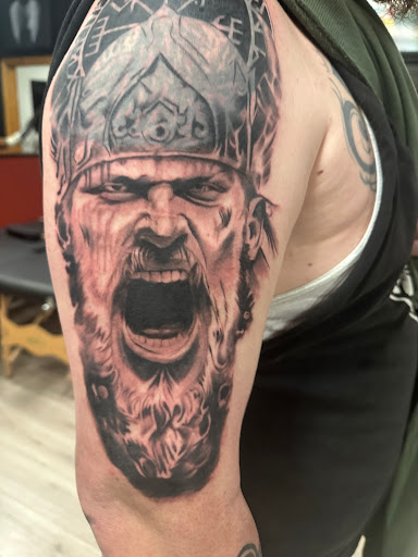Explore behind the ear tattoo ideas, creative tattoo ideas in Laconia, available at Circus Tattoo