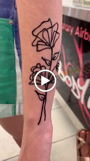 Explore upper arm men tattoo ideas, creative tattoo ideas in South Padre Island, available at Peggys Temporary & Permanent Tattoos