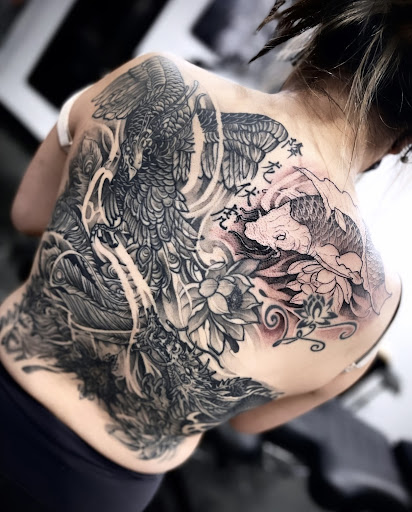 Find dog tattoo idea for your next unique tattoo in Saint Paul at Supreme Art Of War Inc