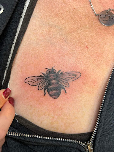 Explore boxing gloves tattoo ideas, creative tattoo ideas in Bethel, available at Resilient Ink