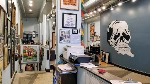 Explore black bear tattoo ideas, creative tattoo ideas in Providence, available at The Torchbearer Tattoo