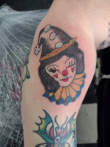 Find ideas for tattoo wedding rings for your next unique tattoo in Owosso at Twisted ink tattoo