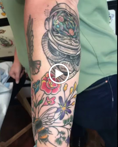 Explore cover up tattoo ideas for lower back, creative tattoo ideas in Libertyville, available at Lucky Seven Tattoo