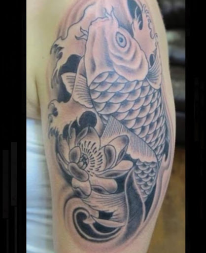 Explore mass effect tattoo ideas, creative tattoo ideas in Ambler, available at Tattoo GalaxyAmbler Piercing & Custom Tattoos