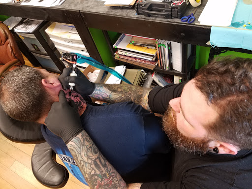 Explore top gun tattoo ideas, creative tattoo ideas in Burlington, available at Mr Tattoos & Piercing