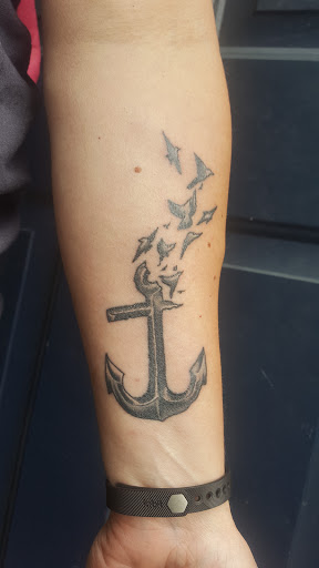 Find cute sloth tattoo ideas for your next unique tattoo in Martins Ferry at Hot Rod Tattooing