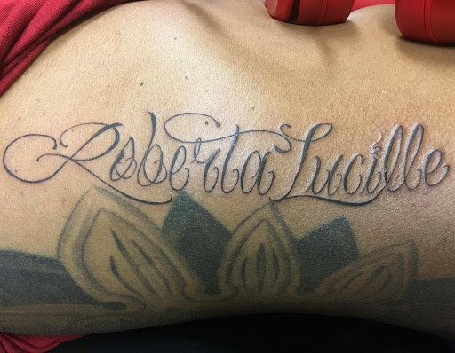 Explore tattoo ideas with your child's name, creative tattoo ideas in Savannah, available at Tatlyfe Studios