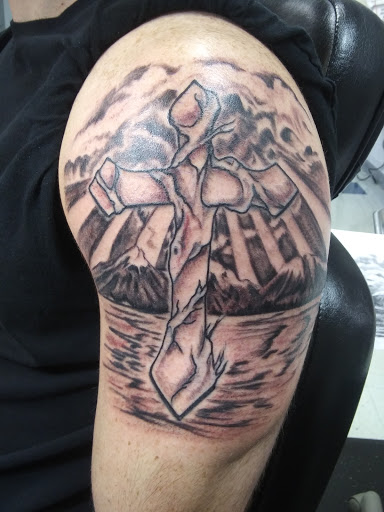 Explore good small tattoo ideas for guys, creative tattoo ideas in Libertyville, available at Art With Atattooed