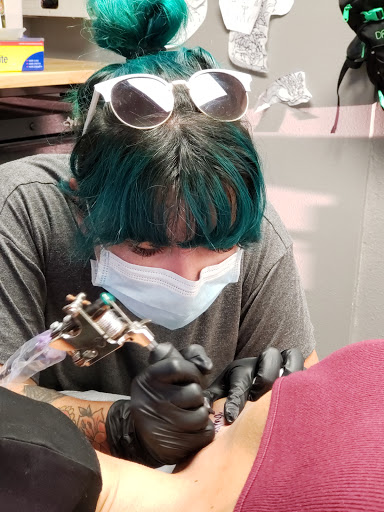 Find peacock tattoo ideas for your next unique tattoo in San Diego at Hustle Tattoo & Piercing Studio