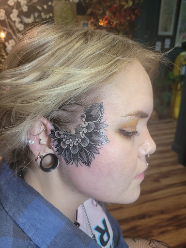 Explore tattoo ideas with your child's name, creative tattoo ideas in Anniston, available at Lucid Dreams Tattoos and Piercings