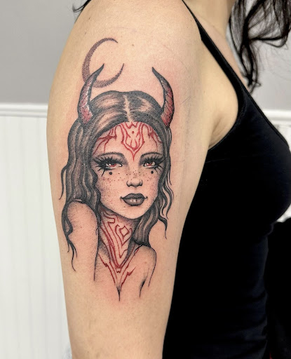 Explore 2 dog tattoo ideas, creative tattoo ideas in New Baltimore, available at Altered Ego Tattoo Studio