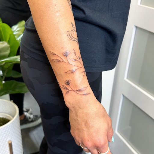 Explore side stomach tattoo ideas, creative tattoo ideas in Lincoln, available at Boutique Ink