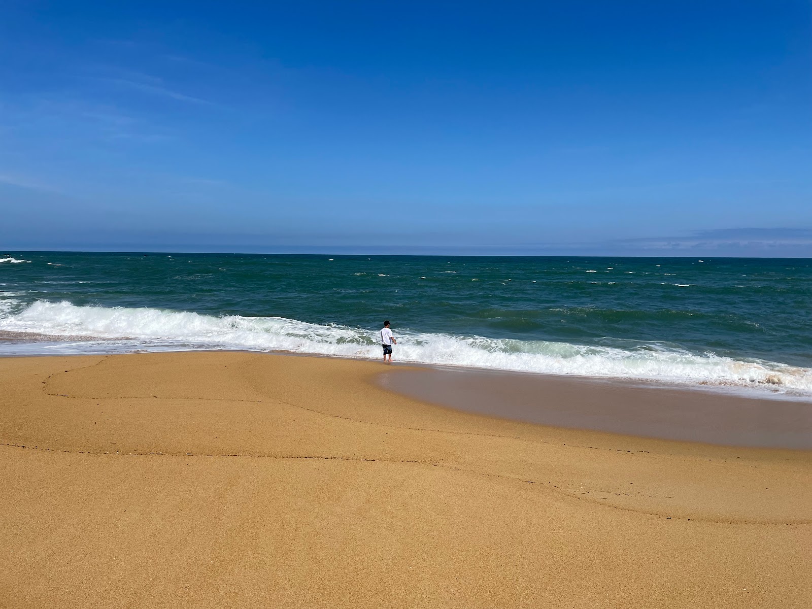 Photo de Go Co Beach avec l'eau cristalline de surface