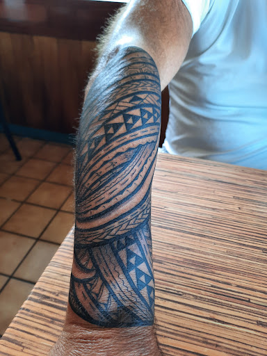 Find inbetween boob tattoo ideas for your next unique tattoo in Hilo at Native Flesh Tattoo